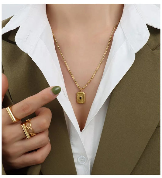 Twisted charm necklace